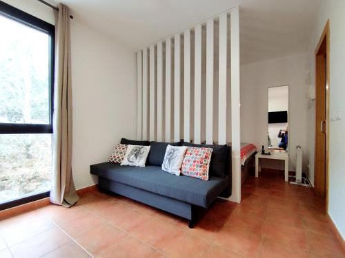 Un lugar para sentarse en Apartamentos Monte Gorbea con parking y wifi by SURYNIEVE