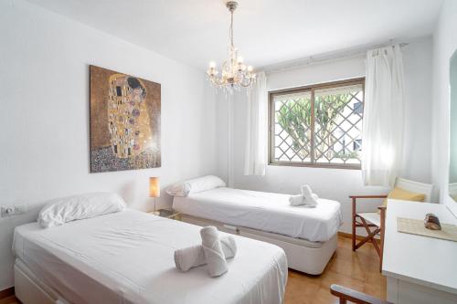 Postel nebo postele na pokoji v ubytování Carabeo II 5 Apartments Casasol