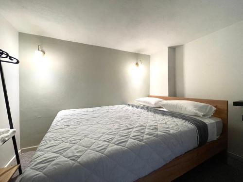 Ένα ή περισσότερα κρεβάτια σε δωμάτιο στο Nikitas loft