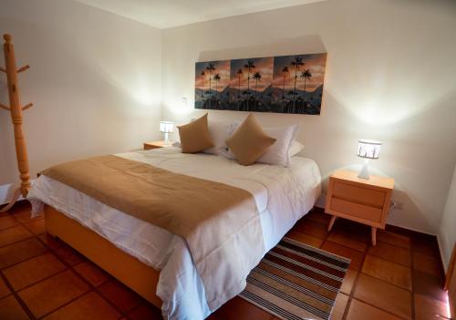 Postel nebo postele na pokoji v ubytování Hotel Balcón del Cielo