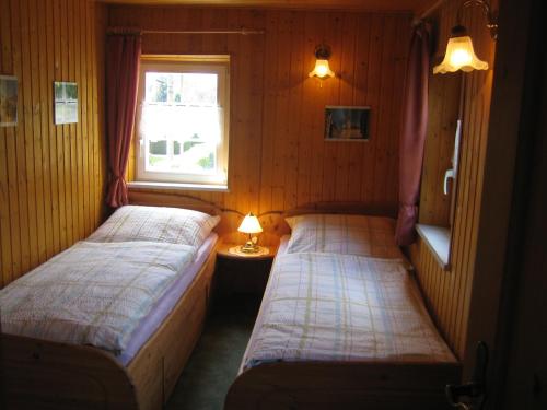 Llit o llits en una habitació de Apartment Schlafwandler