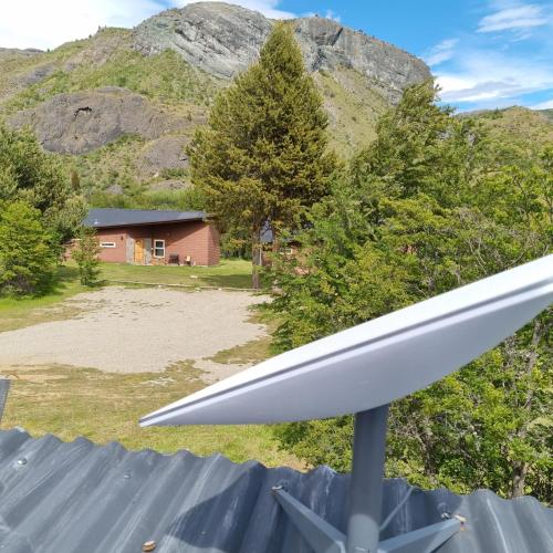 a close up of a propeller of a house with a mountain at Ribera Cochrane, Cochrane in Cochrane