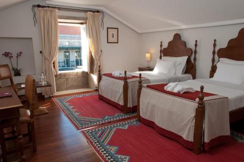 Кровать или кровати в номере Casa Melo Alvim - by Unlock Hotels