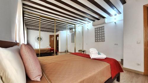 Ένα ή περισσότερα κρεβάτια σε δωμάτιο στο Apartamento SWEET HOME TOLEDO