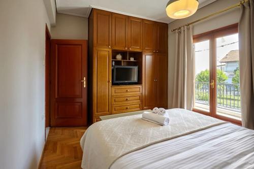 Ένα ή περισσότερα κρεβάτια σε δωμάτιο στο R House Trikala