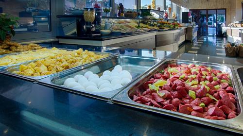a buffet line with many different types of food at Romance Beach Hotel in Marmaris