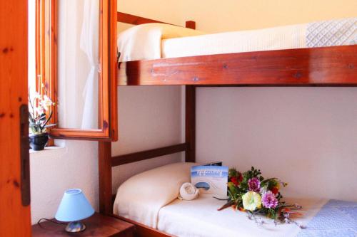 Ένα ή περισσότερα κρεβάτια σε δωμάτιο στο Apartment Costa Rei near Sandy Beaches