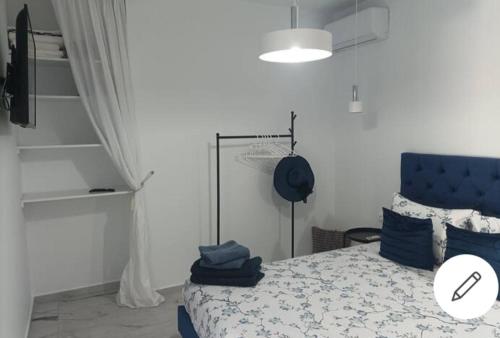 Voodi või voodid majutusasutuse O Kipos Apartment ixia toas
