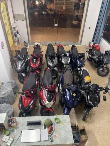 a group of motorcycles parked in a room at NA NI in Da Lat