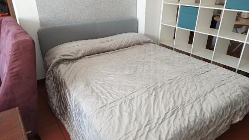 Postel nebo postele na pokoji v ubytování TORINO LINGOTTO MULTI-HOST