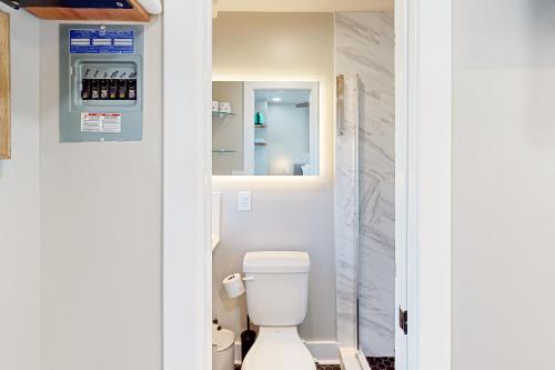 a bathroom with a toilet and a sink at Beach 5 Villas #B3 in Fernandina Beach