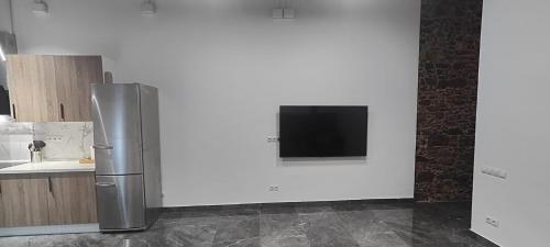 En tv och/eller ett underhållningssystem på Beautiful Appartment in Martorell (Barcelona)