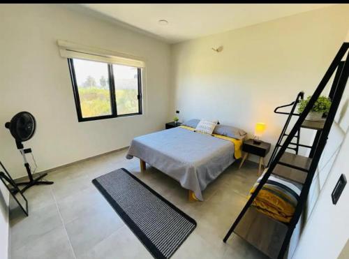 Katil atau katil-katil dalam bilik di La Ventana Apartments View Island #4