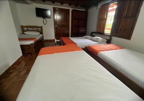 Katil atau katil-katil dalam bilik di Villa Alejandra Del Quindio