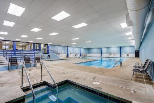 a large indoor pool with two swimming pools at Grace Jo Vacation Home at Tamarack Highland 5 in Wisconsin Dells