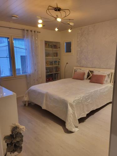 Postel nebo postele na pokoji v ubytování Villa Snowflake