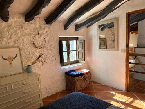 Ένα ή περισσότερα κρεβάτια σε δωμάτιο στο Cortijo Vacas Gordas Villas