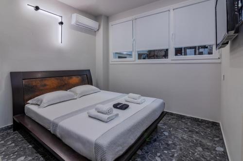 Кровать или кровати в номере Luxury Downtown Apartment Α3