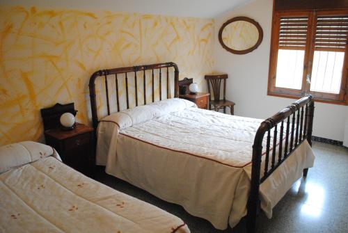 Voodi või voodid majutusasutuse La Badia toas