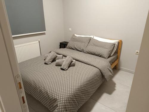 Ένα ή περισσότερα κρεβάτια σε δωμάτιο στο Central apartment's in Trikala 2