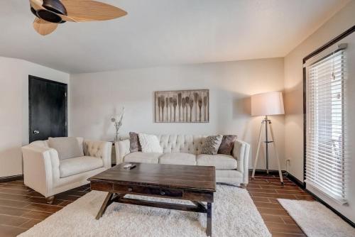 a living room with a couch and a coffee table at Kates Place at Lighthouse Cove in Wisconsin Dells