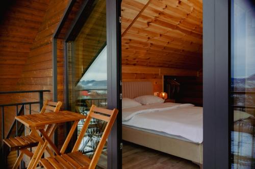 En eller flere senger på et rom på Zenit Chalet Sohodol-Bran
