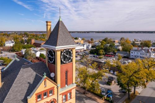 an aerial view of a church with a clock tower at Higgins Downtown Depot in New Bern