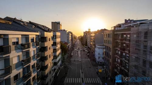 Solopgangen eller solnedgangen set fra lejligheden