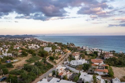 an aerial view of a small town next to the ocean at MariaMar Suites in San José del Cabo