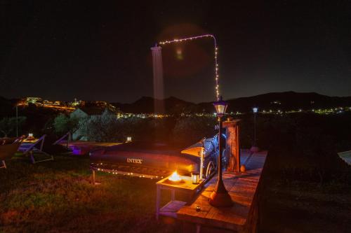 a lit up street light on a deck at night at La Terrazza di Laurino in Laurino