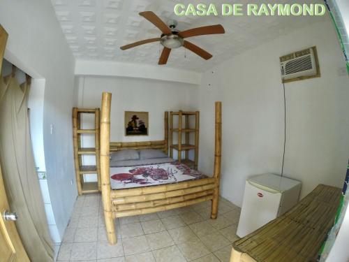 Ένα ή περισσότερα κρεβάτια σε δωμάτιο στο Casa de Hamacas