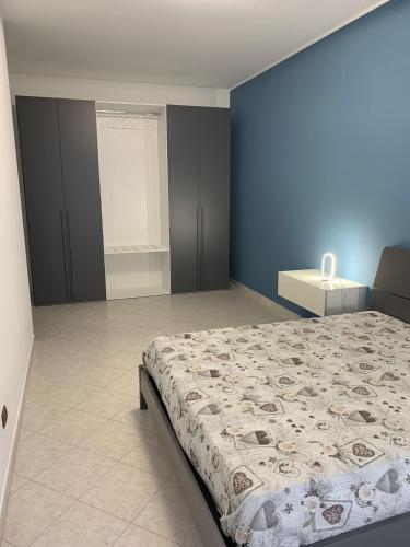 Una cama o camas en una habitación de Roxy House Trani