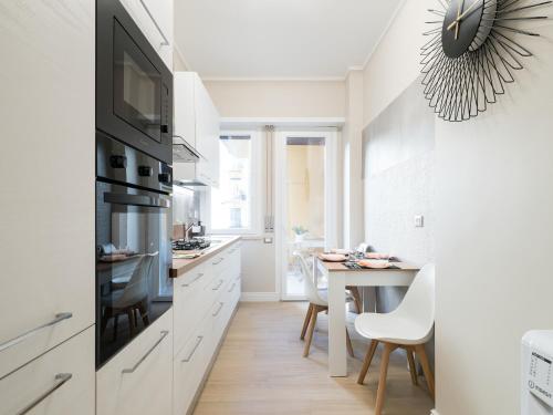 Η κουζίνα ή μικρή κουζίνα στο 50 Apartments Rome