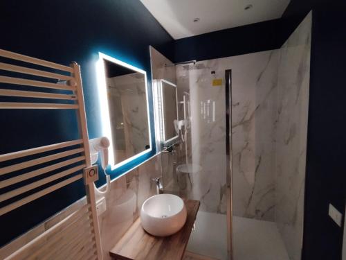 a bathroom with a shower and a toilet in it at Ca' Piasentin in Venice