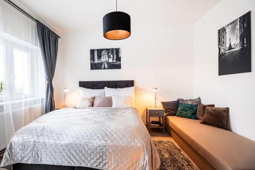 Ένα ή περισσότερα κρεβάτια σε δωμάτιο στο Silvie Apartments - Lazecká