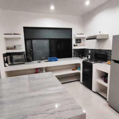 Кухня или мини-кухня в Bonito departamento
