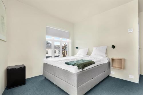 Ένα ή περισσότερα κρεβάτια σε δωμάτιο στο Central Guest House - Bedroom with en suite Bathroom