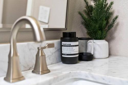 a bathroom sink with a bottle of hand lotion on it at Tahoe Bliss: Ski, Hike, & Relax in Incline Village