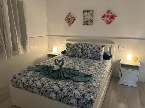 Llit o llits en una habitació de Puerta del Sol Caleta Fuste (Fuerteventura)