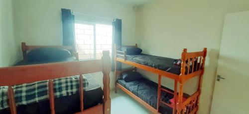 Ένα ή περισσότερα κρεβάτια σε δωμάτιο στο Casa Monções