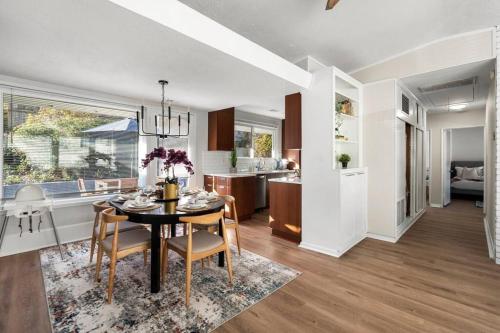 a dining room and kitchen with a table and chairs at FallsChurch, Tysons Corner, Dulles airport, DC in Falls Church