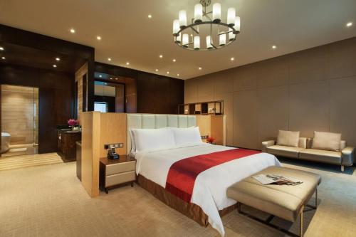 Cama o camas de una habitación en Holiday Inn Putian Xiuyu by IHG