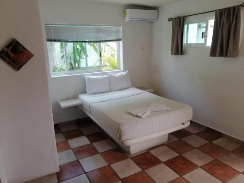 Katil atau katil-katil dalam bilik di Hotel Dos Mundos, Isla Cozumel