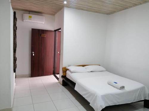 Katil atau katil-katil dalam bilik di Hotel Ambeyma