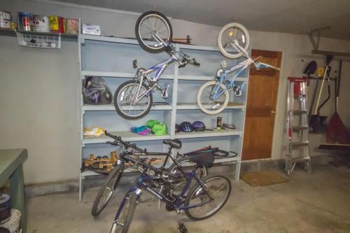 two bikes are on the shelves in a garage at The Sisters Moose in Sisters