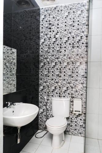 Koupelna v ubytování Hotel Ariandri Puncak