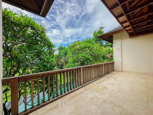 an empty balcony of a house with trees at Villa Prinsessa in Siyut