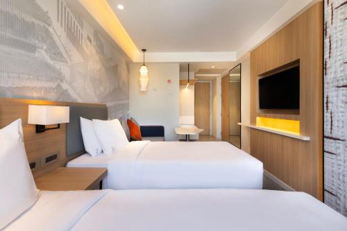 Postel nebo postele na pokoji v ubytování Holiday Inn Express Kathmandu Naxal by IHG