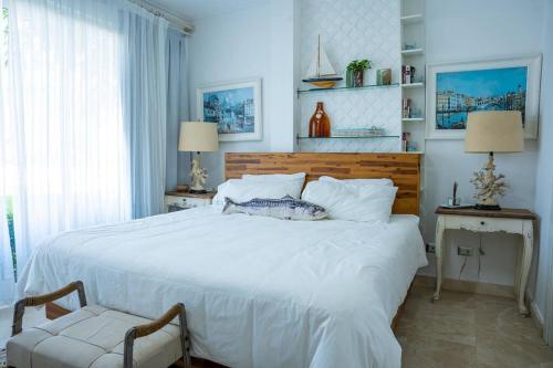 En eller flere senger på et rom på Riviera Azul -2 Hab con vista a la Piscina