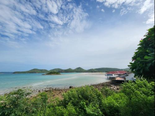 a view of a beach with a house on it at HOMEis Villa Sattahip in Ban Tao Than